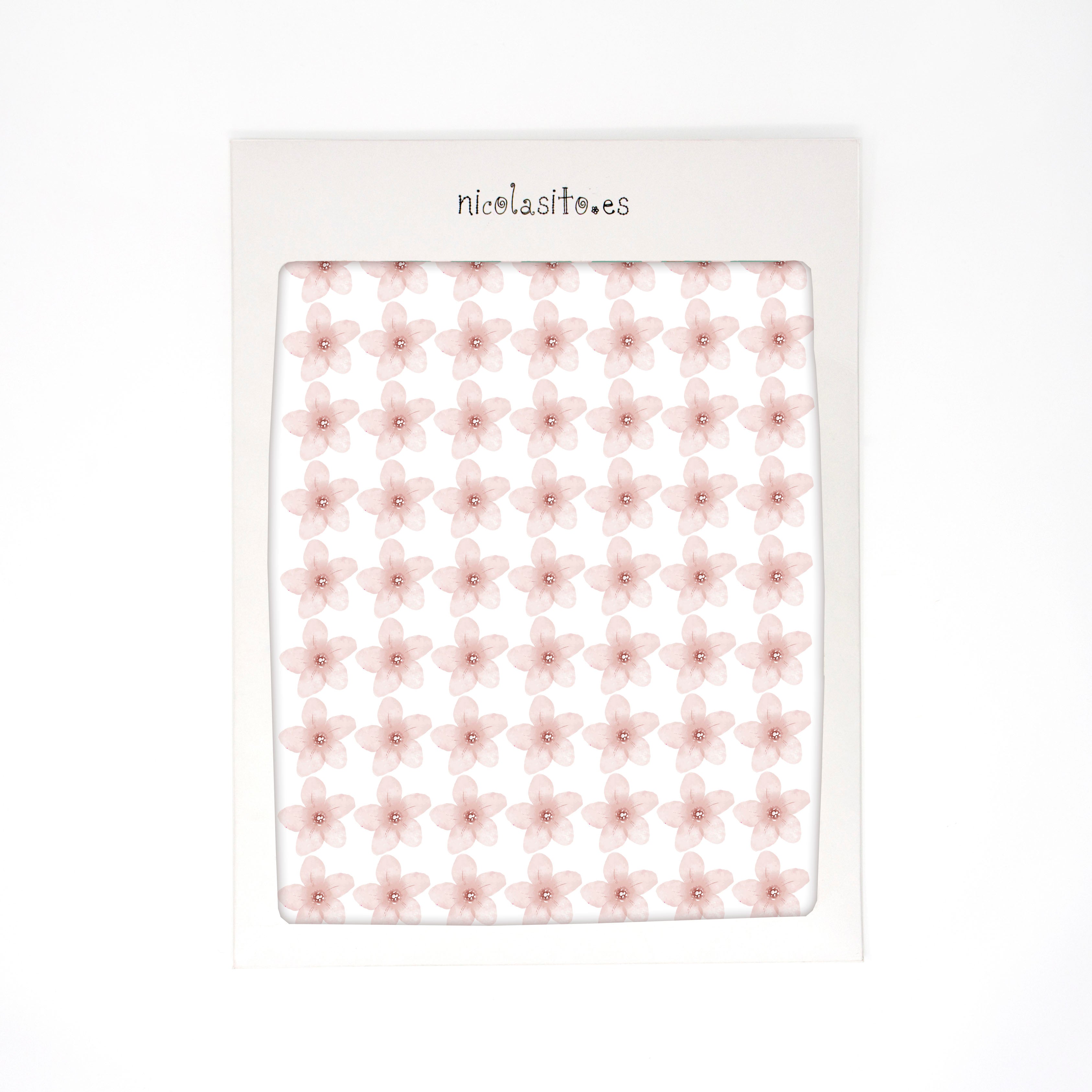 Plano detalle del vinilo decorativo flores de cerezo en color rosa y con acabado acuarela, en su embalaje original, enseñando cómo llegaría - Nicolasito.es #color_flores cerezo rosa