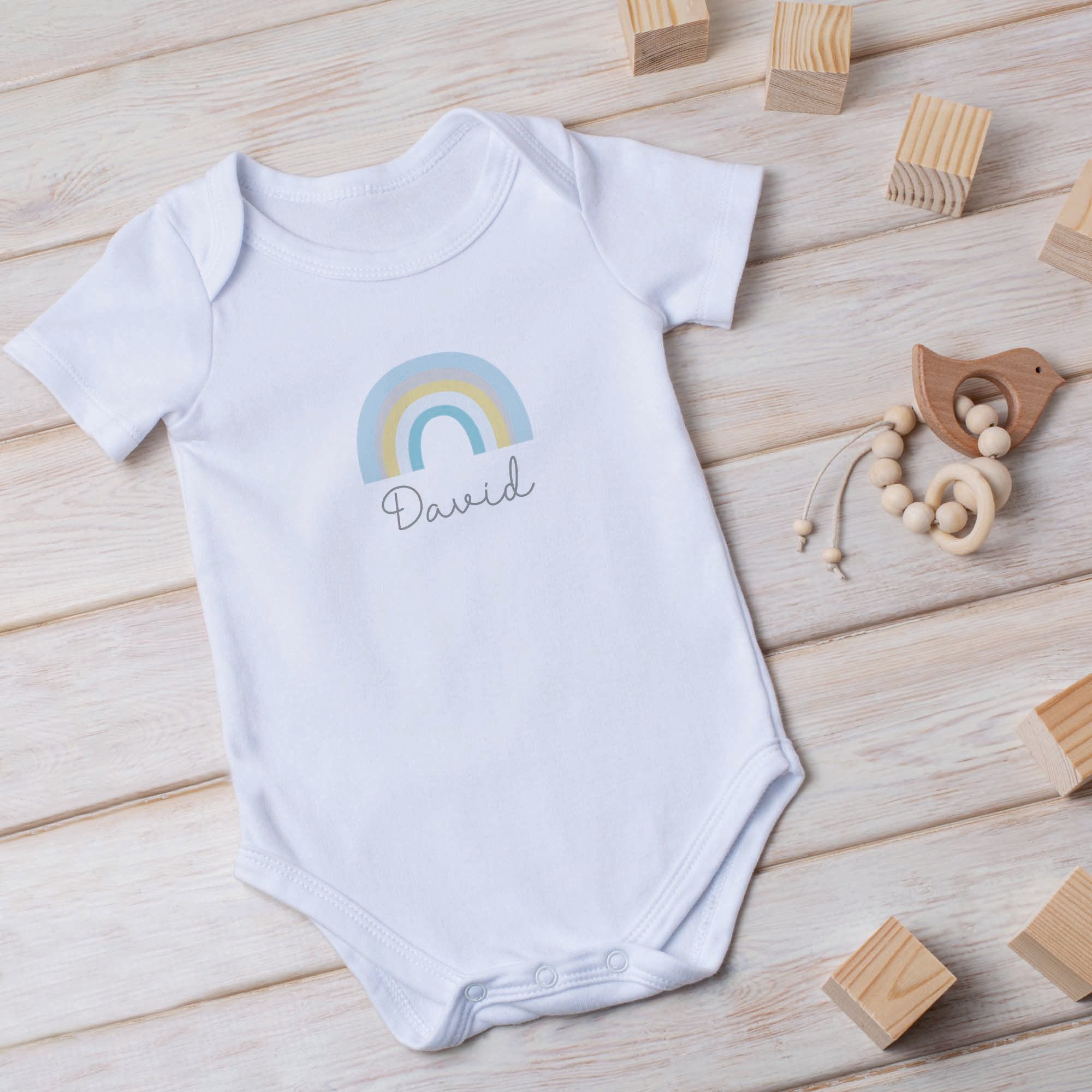 comprar body inantil personalizado con dibujo de arcoiris en color azul
