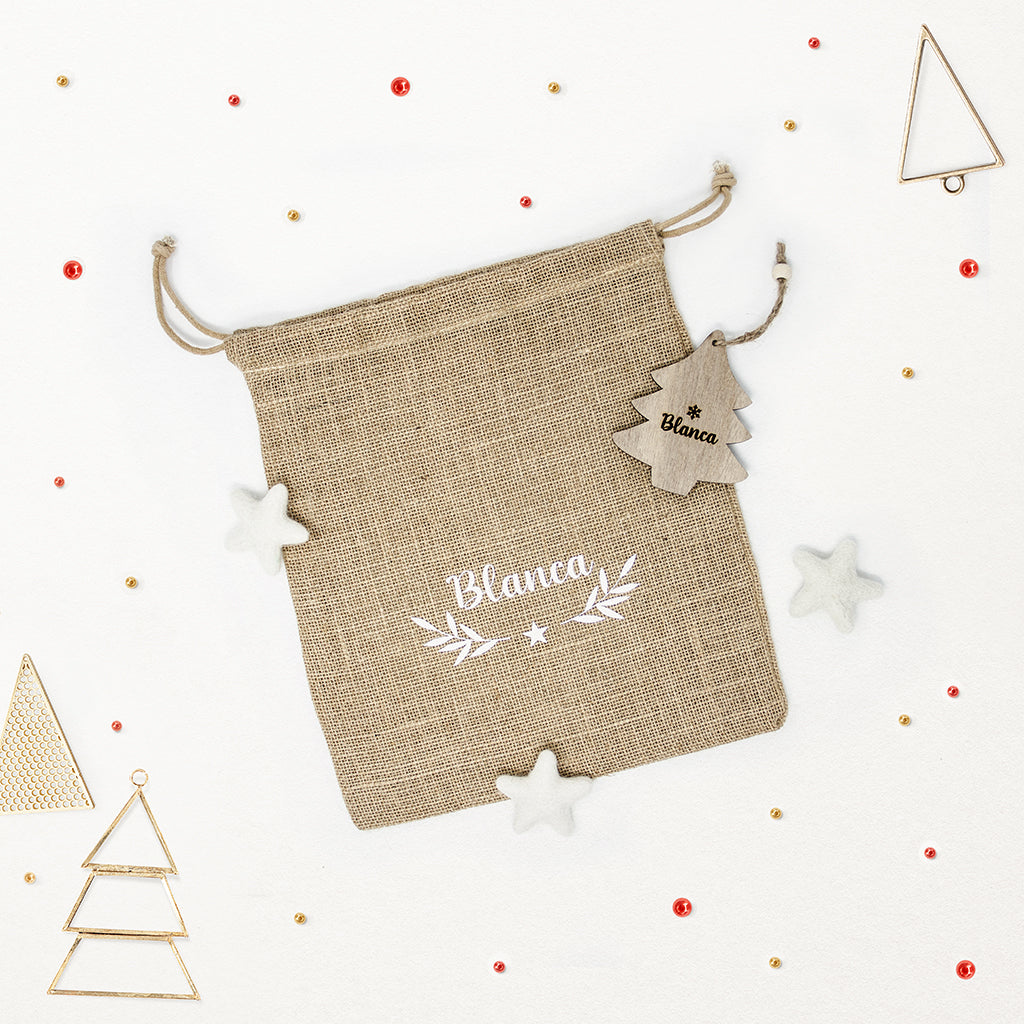 Saco de Navidad blanco de yute, decoración navideña personalizada con nombre grabado - Nicolasito.es #color_Blanco