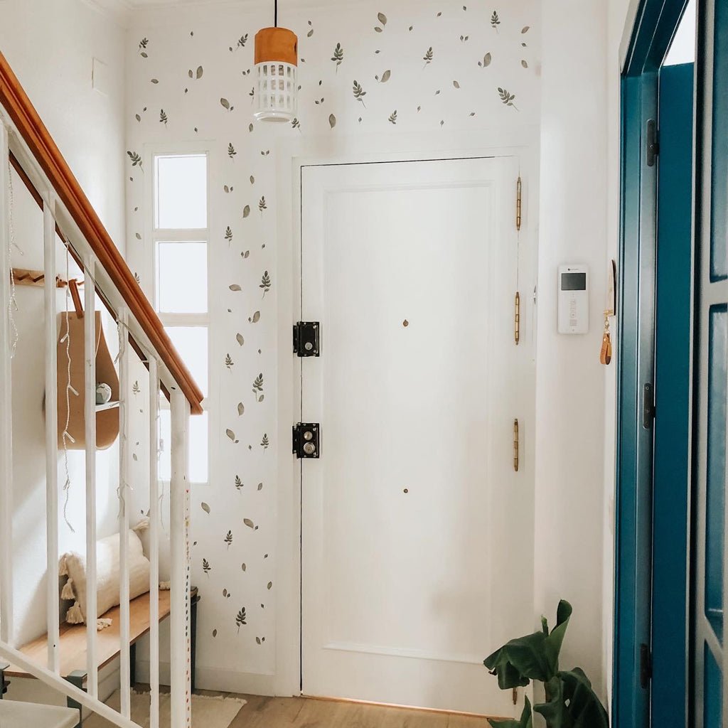 Recibidor pequeño bonito con decoración de pared vinilo de plantas nicolasito.