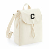 comprar mochilas pesonalizadas con inicial en color beige