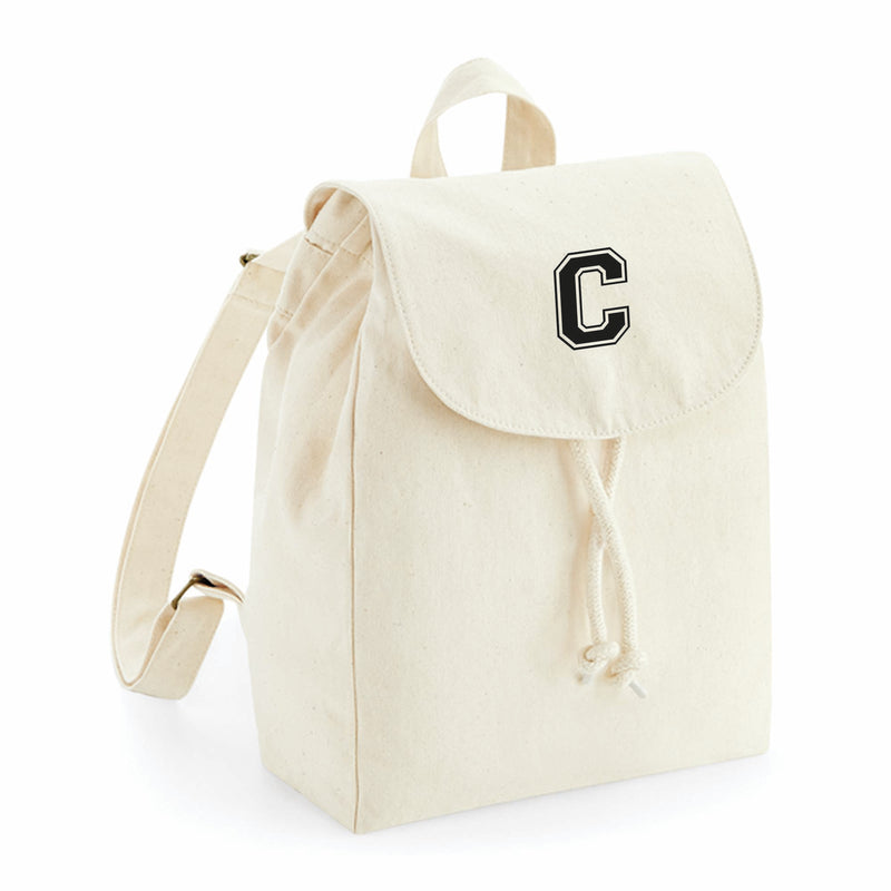 comprar mochilas pesonalizadas con inicial en color beige