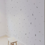 Decoración de pared cuarto infantil con vinilos de hojas pastel de nicolasito